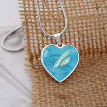 Load image into Gallery viewer, Angelic feathers blue bg : Heart charm necklace, Gold or Silver Plated  with chain necklace- In luxury packaging - Free standard shipping

