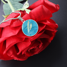 Load image into Gallery viewer, Angelic feathers blue bg Round Charm, Gold or Silver Plated, with strong chain necklace   - In luxury packaging - Free standard shipping
