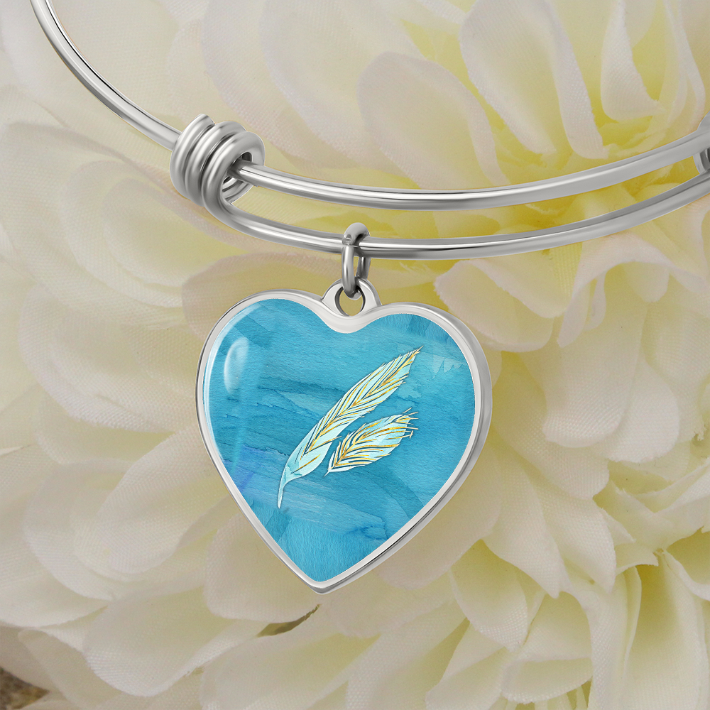 Angelic Feathers: Original art by Vassia Sarri, decorates your shoes, clothes, jewelries, stationery, bedding and linen, as well as kitchen and drinkware items, in order to bring positive vibes in your life, and reprogram your subconscious towards joyous, healthy and prosperous opportunities.